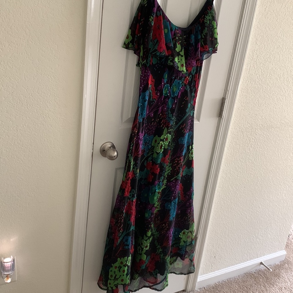 Floral dress. Black background.